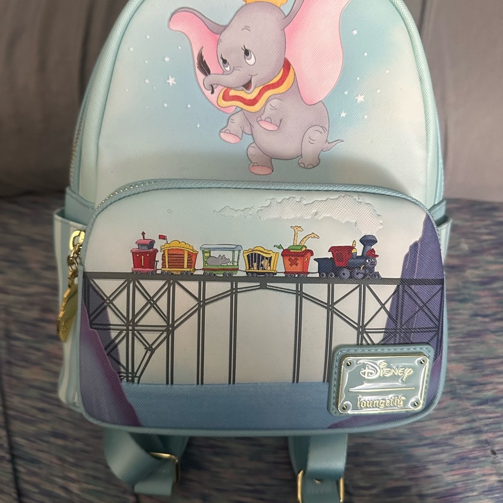Loungefly Disney Dumbo Pastel Blue Kids Backpack with Train Detail